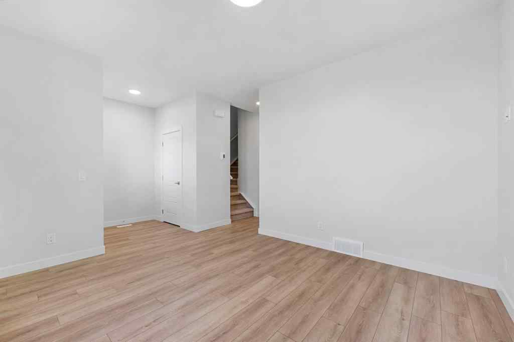 MLS® A2263359 - 125 Ambleton Boulevard NW in Moraine Calgary, Residential