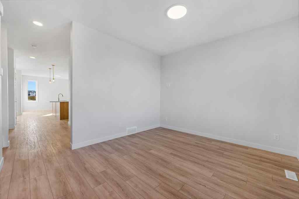 MLS® A2263359 - 125 Ambleton Boulevard NW in Moraine Calgary, Residential