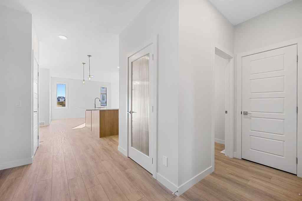 MLS® A2263359 - 125 Ambleton Boulevard NW in Moraine Calgary, Residential