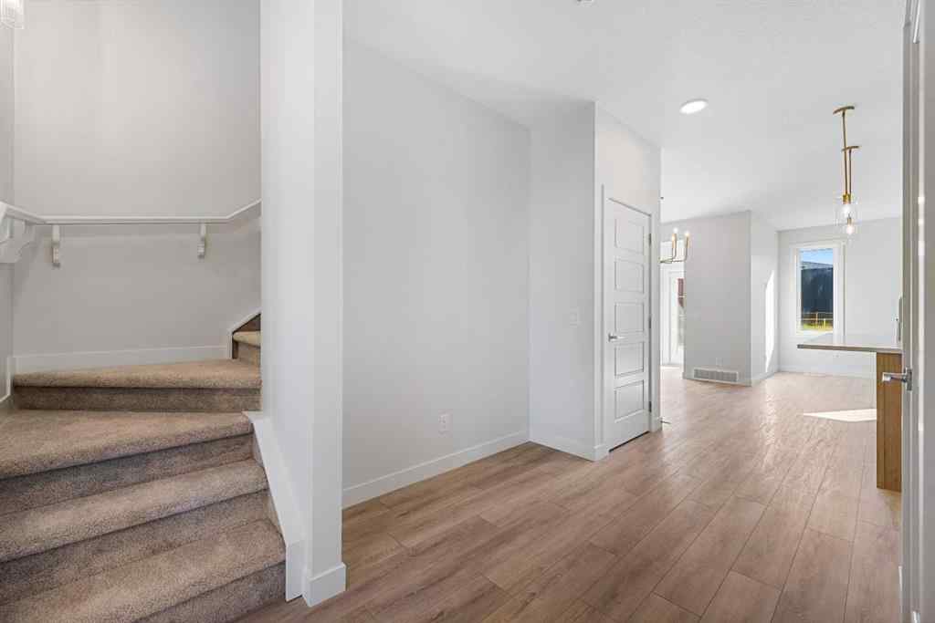 MLS® A2263359 - 125 Ambleton Boulevard NW in Moraine Calgary, Residential