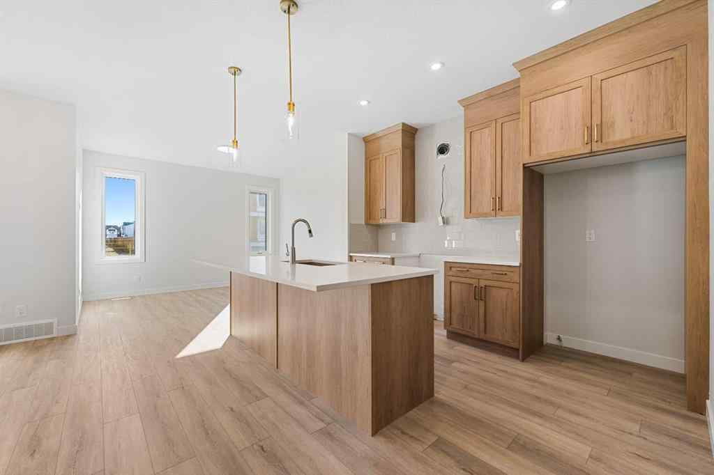 MLS® A2263359 - 125 Ambleton Boulevard NW in Moraine Calgary, Residential