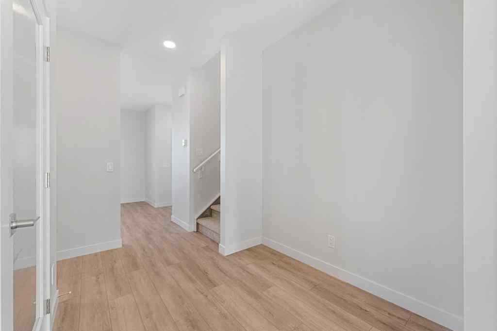 MLS® A2263359 - 125 Ambleton Boulevard NW in Moraine Calgary, Residential