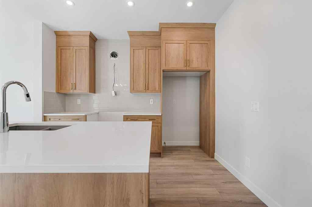 MLS® A2263359 - 125 Ambleton Boulevard NW in Moraine Calgary, Residential