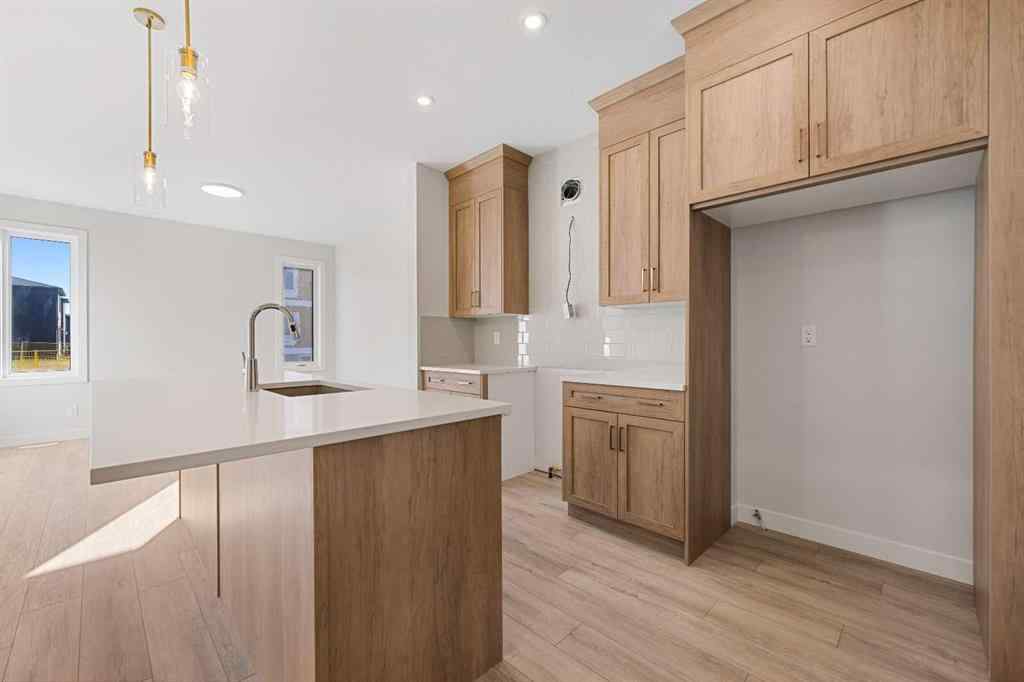 MLS® A2263359 - 125 Ambleton Boulevard NW in Moraine Calgary, Residential