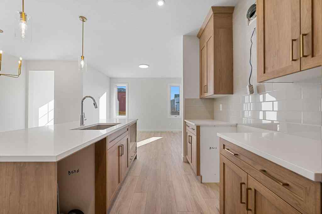 MLS® A2263359 - 125 Ambleton Boulevard NW in Moraine Calgary, Residential