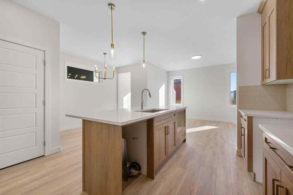 MLS® A2263359 - 125 Ambleton Boulevard NW in Moraine Calgary, Residential