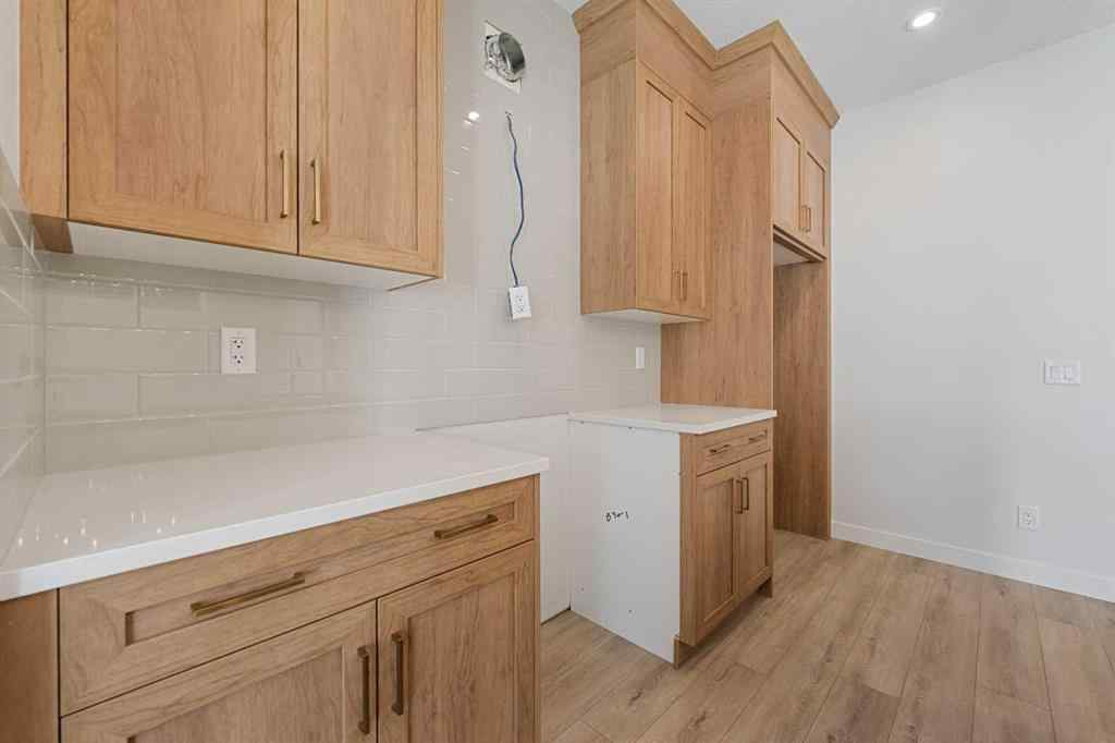 MLS® A2263359 - 125 Ambleton Boulevard NW in Moraine Calgary, Residential