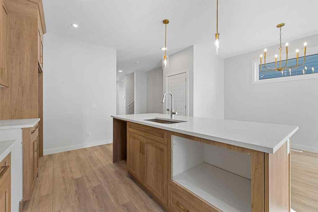 MLS® A2263359 - 125 Ambleton Boulevard NW in Moraine Calgary, Residential