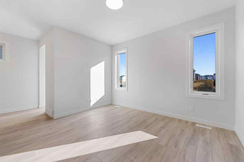 MLS® A2263359 - 125 Ambleton Boulevard NW in Moraine Calgary, Residential