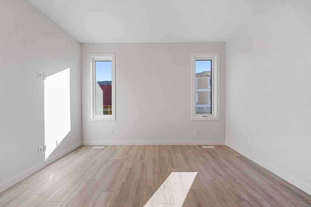 MLS® A2263359 - 125 Ambleton Boulevard NW in Moraine Calgary, Residential