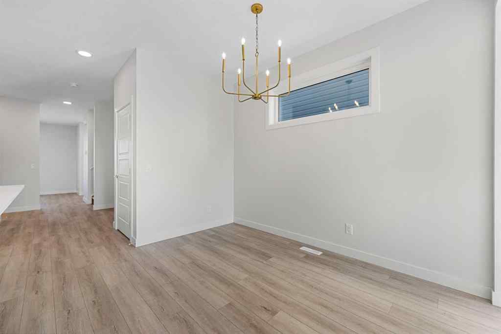 MLS® A2263359 - 125 Ambleton Boulevard NW in Moraine Calgary, Residential