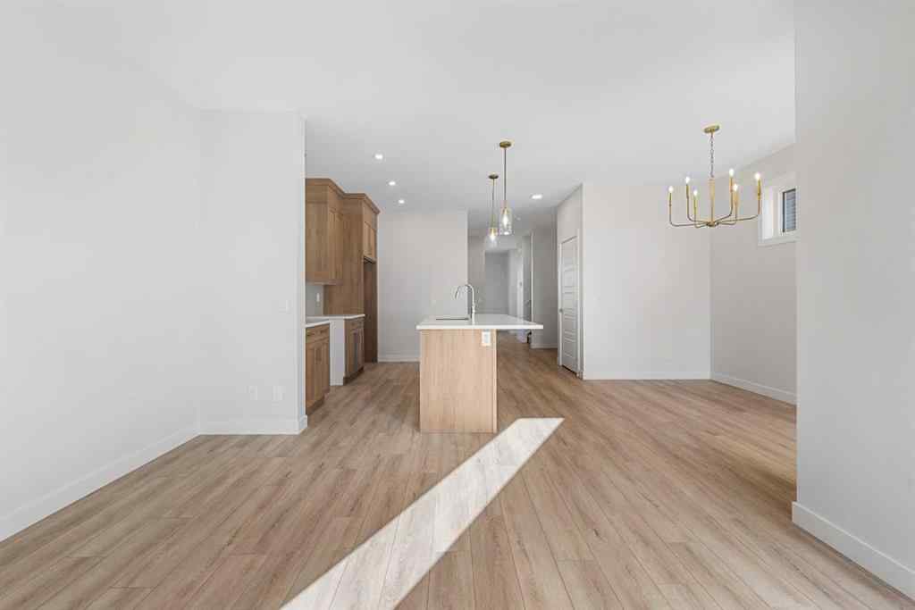 MLS® A2263359 - 125 Ambleton Boulevard NW in Moraine Calgary, Residential