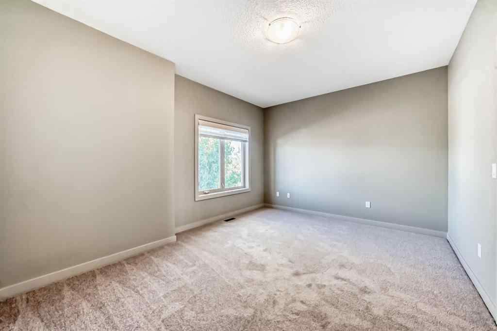 MLS® A2263362 - 12 Cougar Ridge Landing SW in Cougar Ridge Calgary, Residential