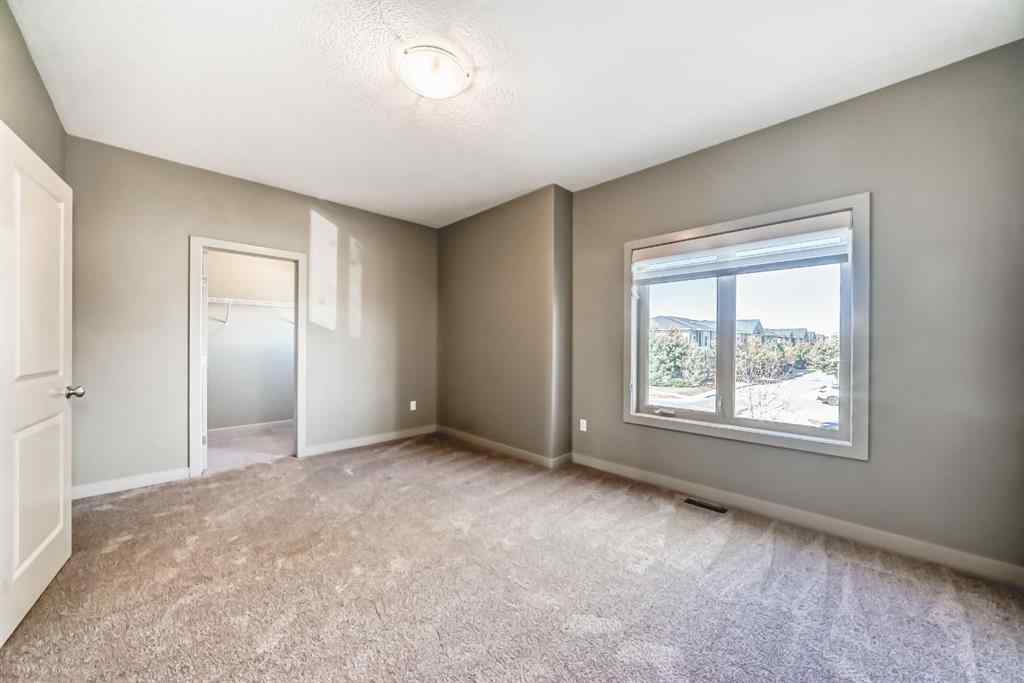 MLS® A2263362 - 12 Cougar Ridge Landing SW in Cougar Ridge Calgary, Residential