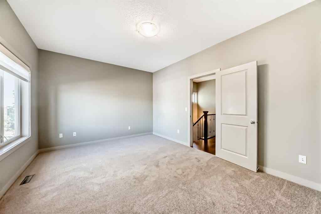 MLS® A2263362 - 12 Cougar Ridge Landing SW in Cougar Ridge Calgary, Residential