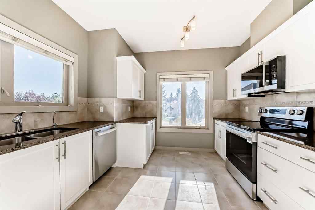MLS® A2263362 - 12 Cougar Ridge Landing SW in Cougar Ridge Calgary, Residential