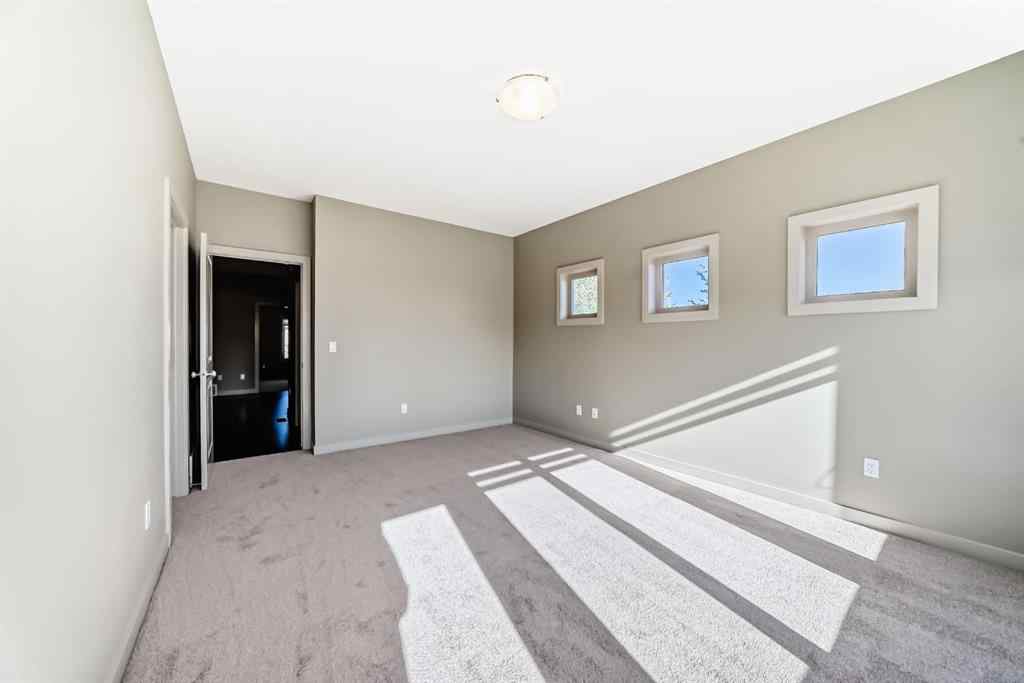MLS® A2263362 - 12 Cougar Ridge Landing SW in Cougar Ridge Calgary, Residential