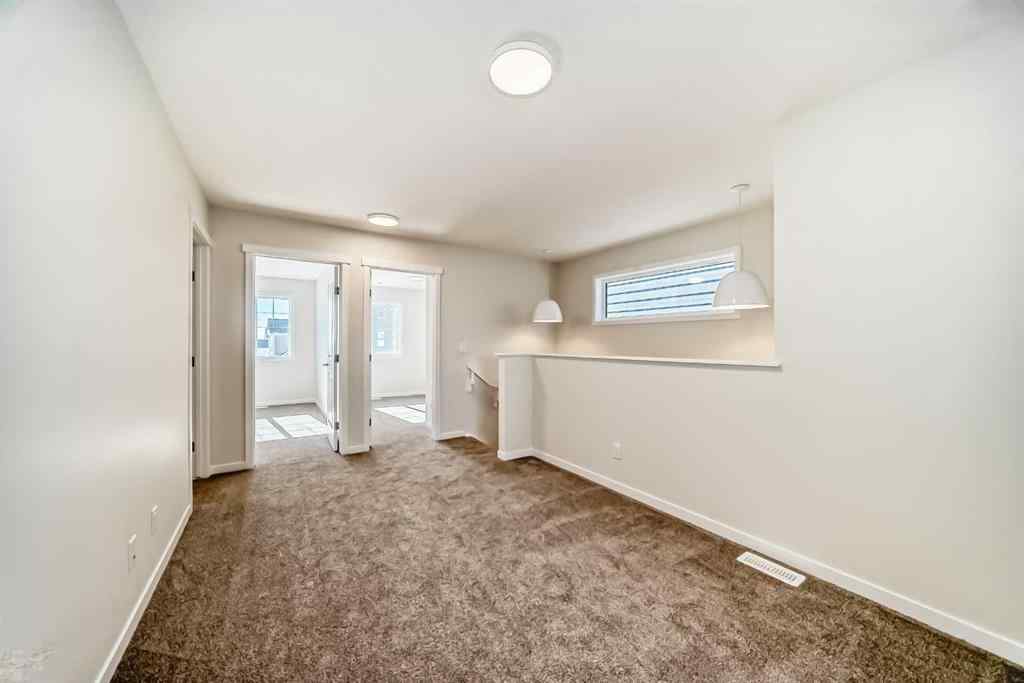 MLS® A2263370 - 1030 Sawgrass Link NW in Sawgrass Park Airdrie, Residential