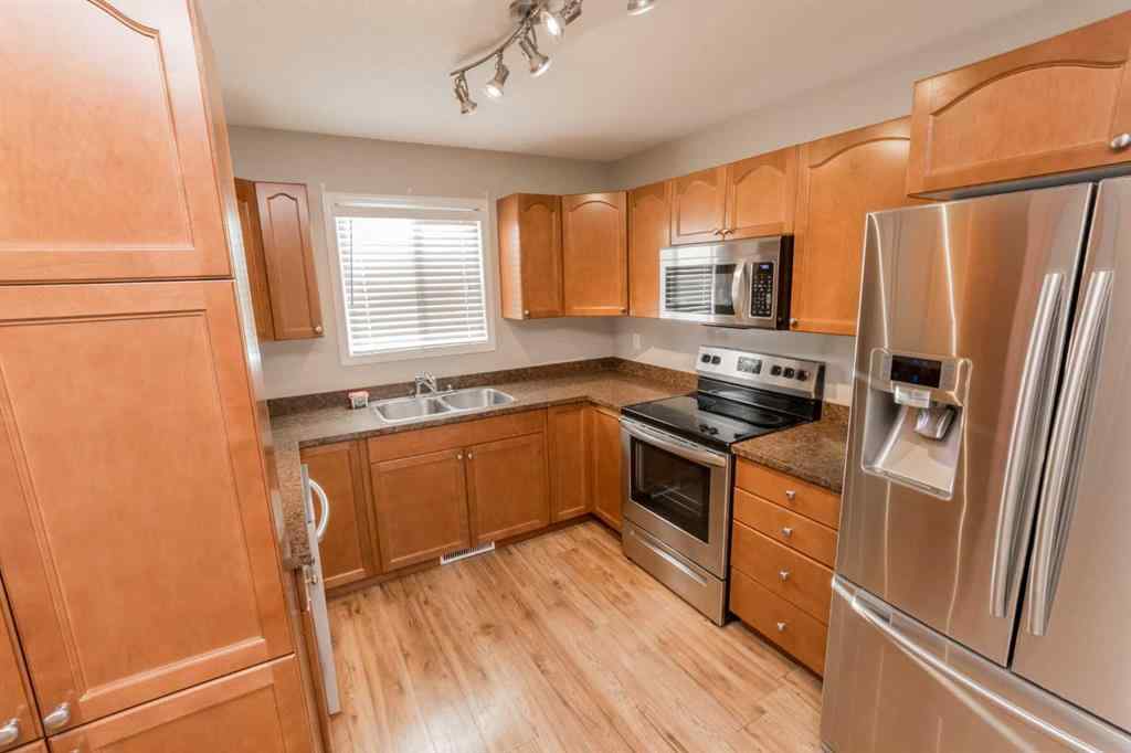 MLS® A2263371 - 11513 76 Avenue  in Westpointe Grande Prairie, Residential