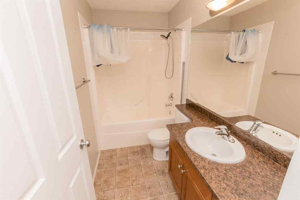 MLS® A2263371 - 11513 76 Avenue  in Westpointe Grande Prairie, Residential