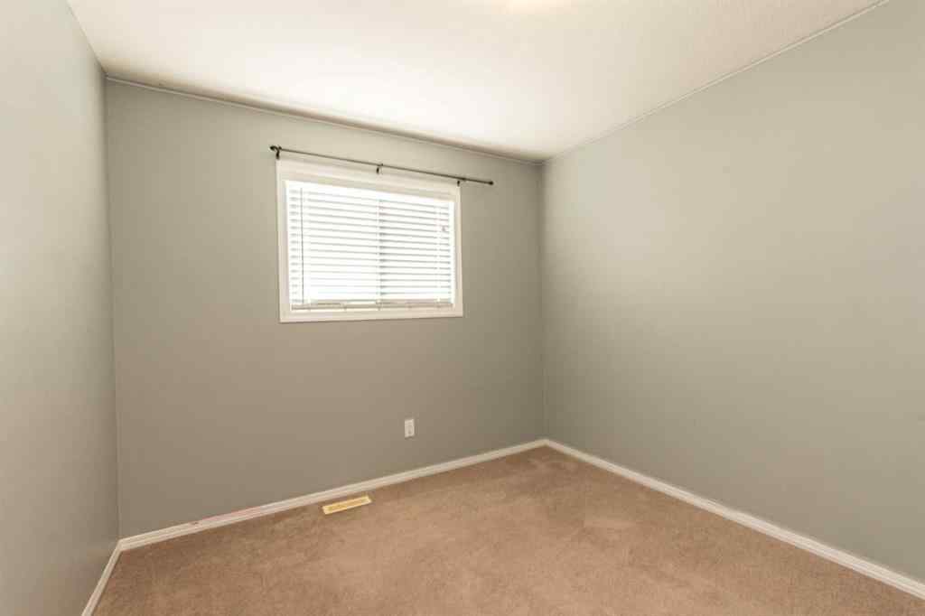 MLS® A2263371 - 11513 76 Avenue  in Westpointe Grande Prairie, Residential