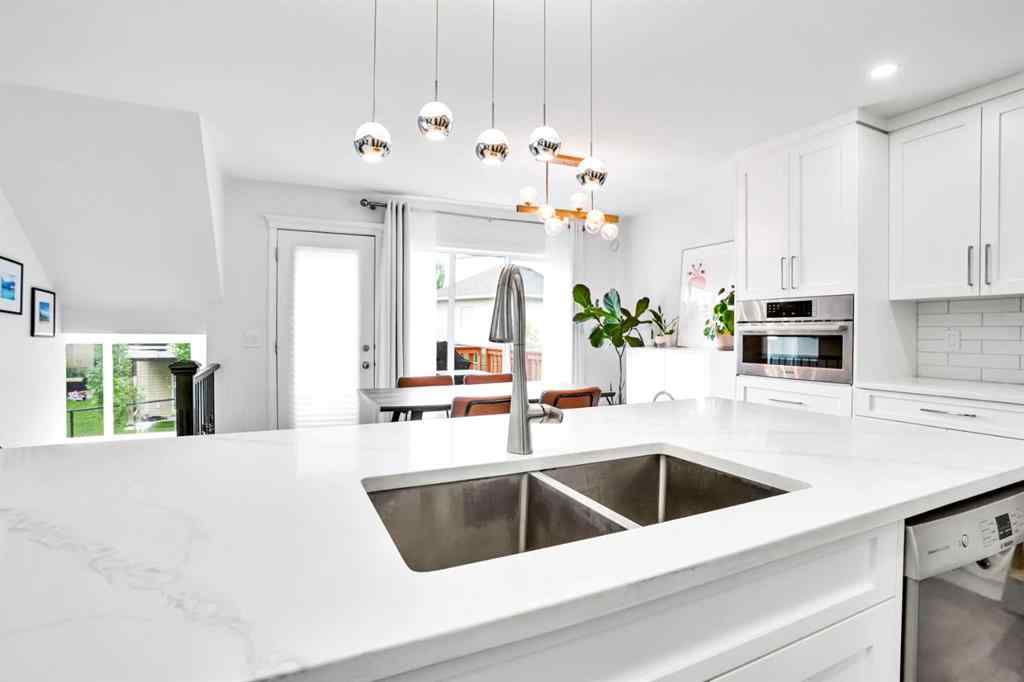 MLS® A2263378 - 73 Elkton Way SW in Springbank Hill Calgary, Residential