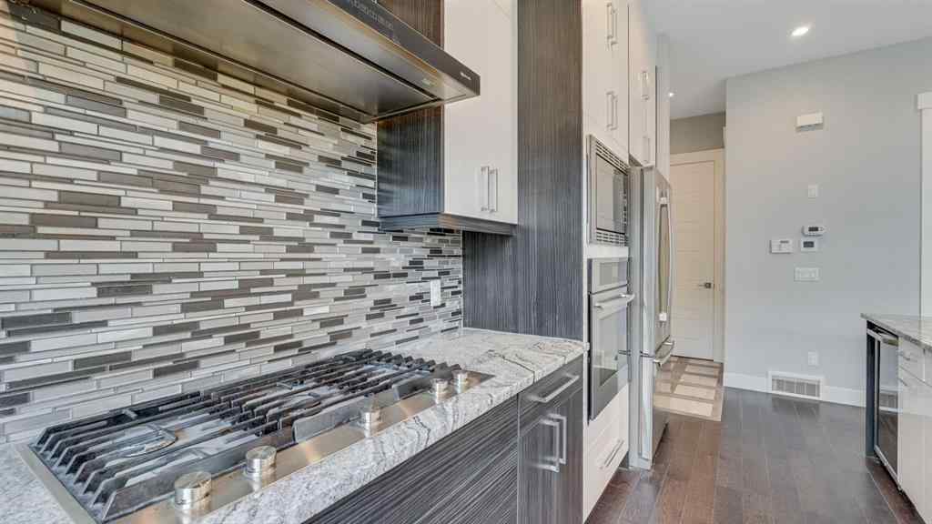 MLS® A2263391 - 230 37 Street NW in Parkdale Calgary, Residential