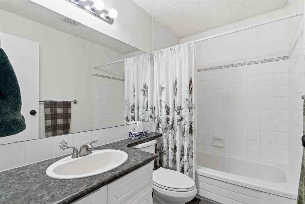 MLS® A2263400 - 91 Deerfield Drive SE in Deer Ridge Calgary, Residential