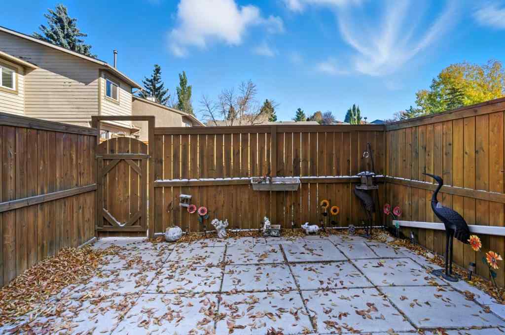 MLS® A2263400 - 91 Deerfield Drive SE in Deer Ridge Calgary, Residential
