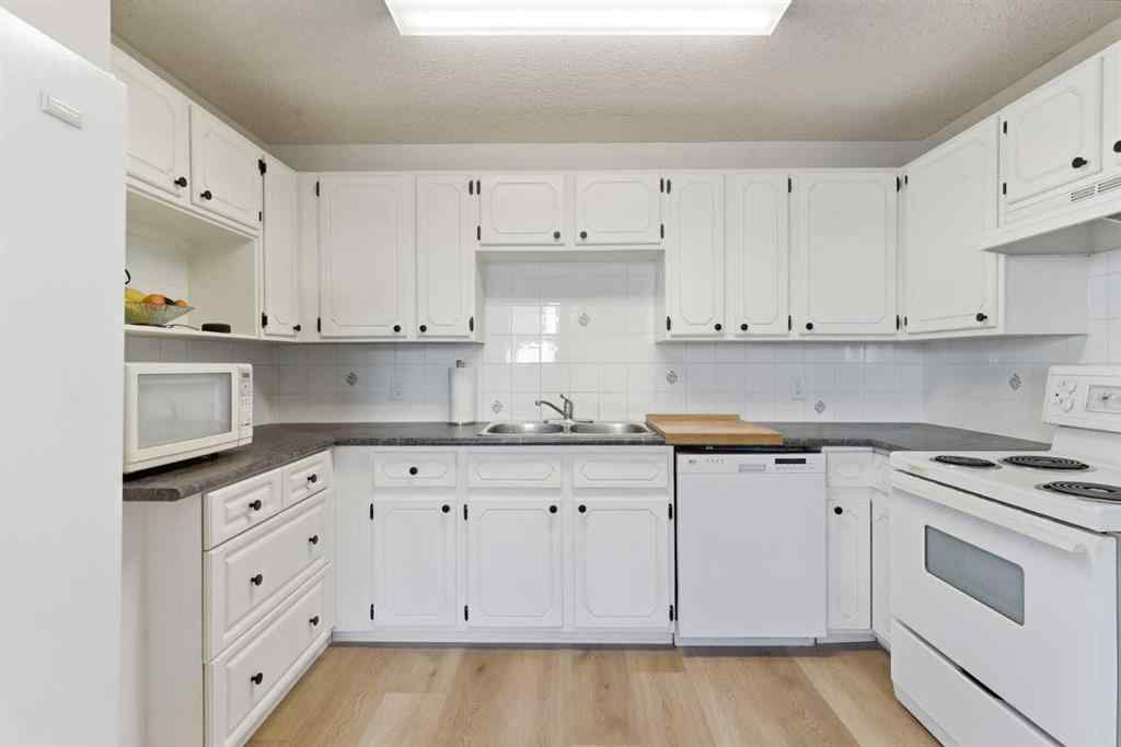 MLS® A2263400 - 91 Deerfield Drive SE in Deer Ridge Calgary, Residential