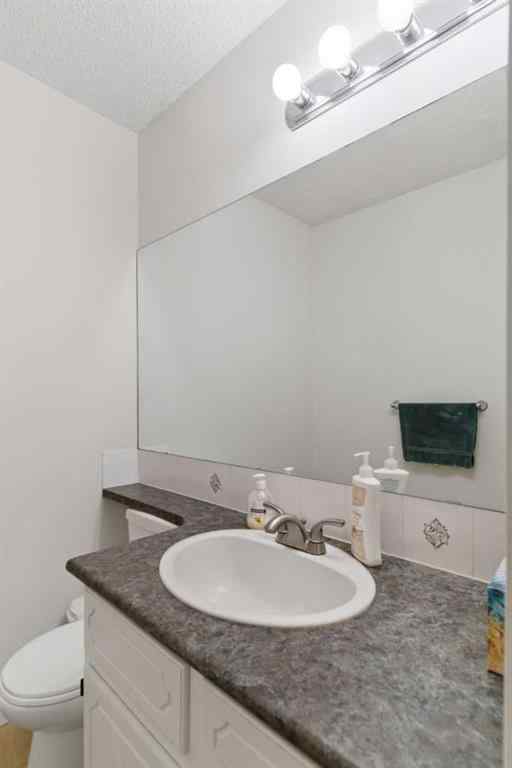 MLS® A2263400 - 91 Deerfield Drive SE in Deer Ridge Calgary, Residential