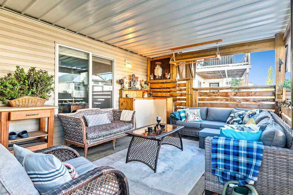 MLS® A2263407 - 394 Cimarron Boulevard  in Cimarron Okotoks, Residential