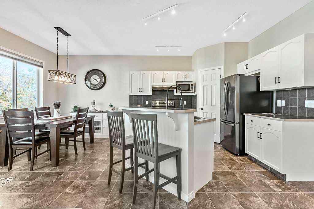 MLS® A2263407 - 394 Cimarron Boulevard  in Cimarron Okotoks, Residential