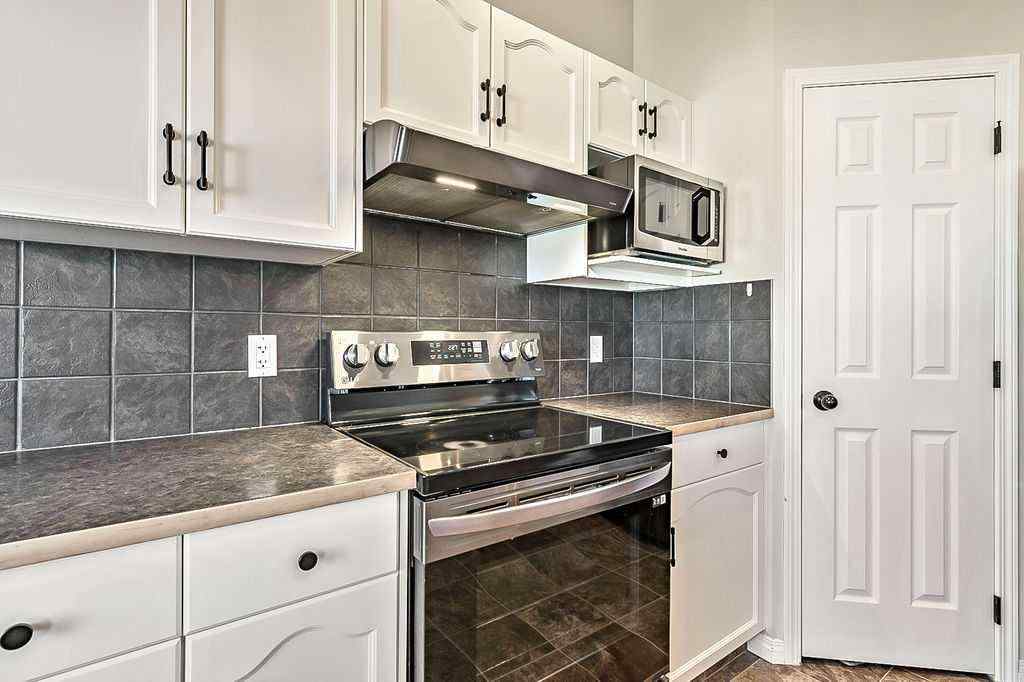 MLS® A2263407 - 394 Cimarron Boulevard  in Cimarron Okotoks, Residential