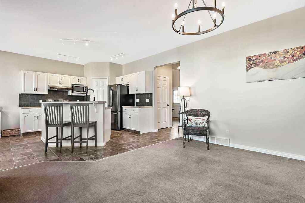 MLS® A2263407 - 394 Cimarron Boulevard  in Cimarron Okotoks, Residential