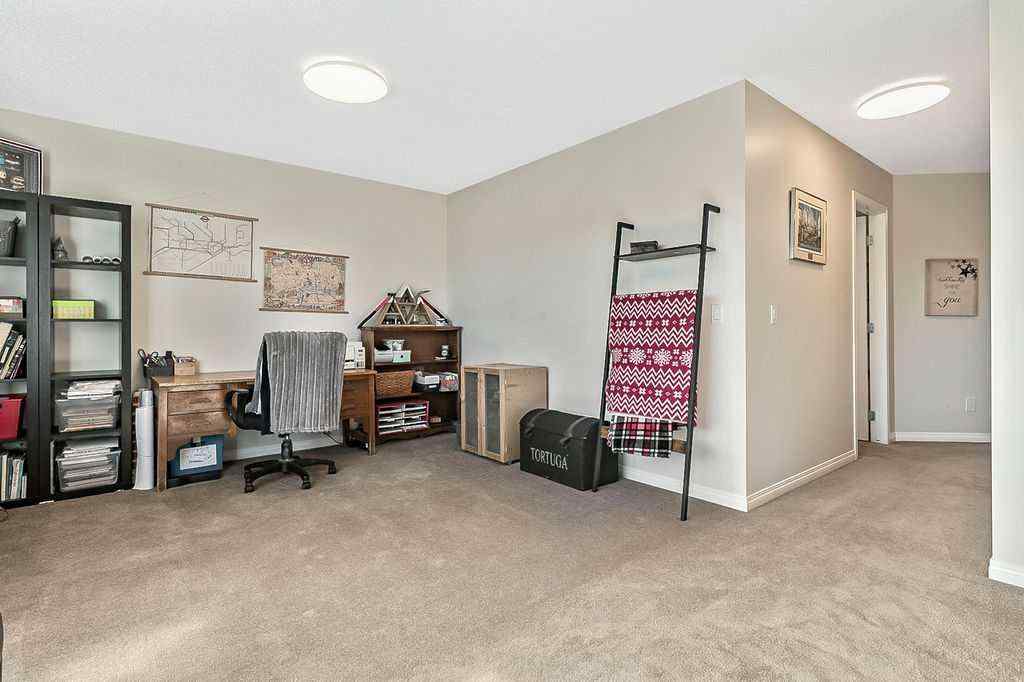 MLS® A2263407 - 394 Cimarron Boulevard  in Cimarron Okotoks, Residential