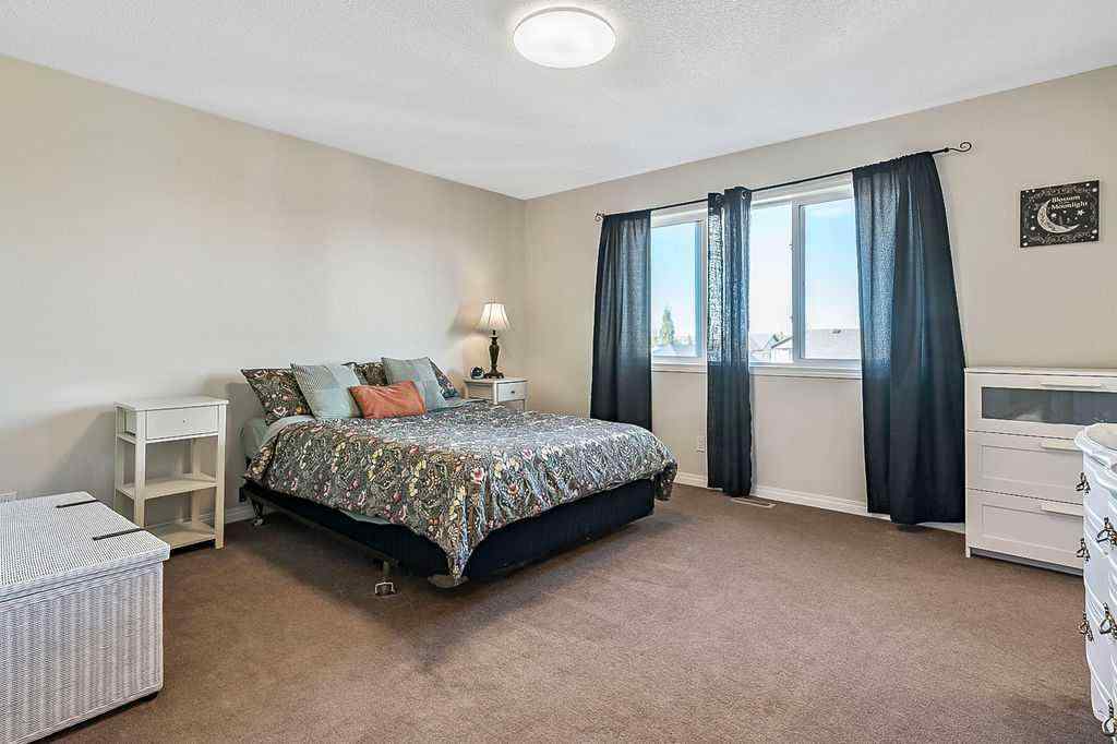 MLS® A2263407 - 394 Cimarron Boulevard  in Cimarron Okotoks, Residential