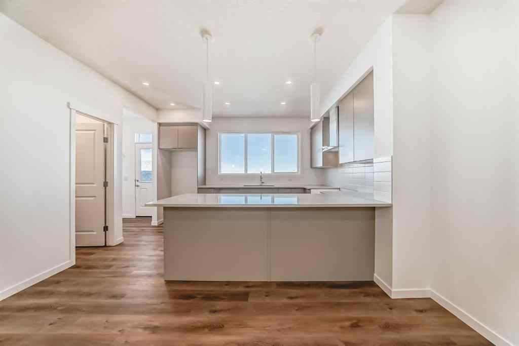 MLS® A2263417 - 1038 Sawgrass Link NW in Sawgrass Park Airdrie, Residential