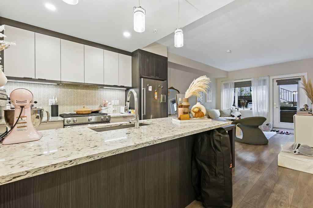 MLS® A2263425 - Unit #111 3375 15 Street SW in South Calgary Calgary, Residential