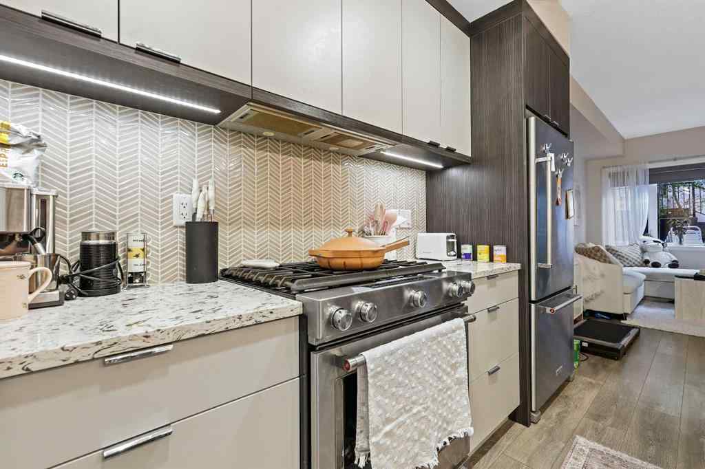MLS® A2263425 - Unit #111 3375 15 Street SW in South Calgary Calgary, Residential