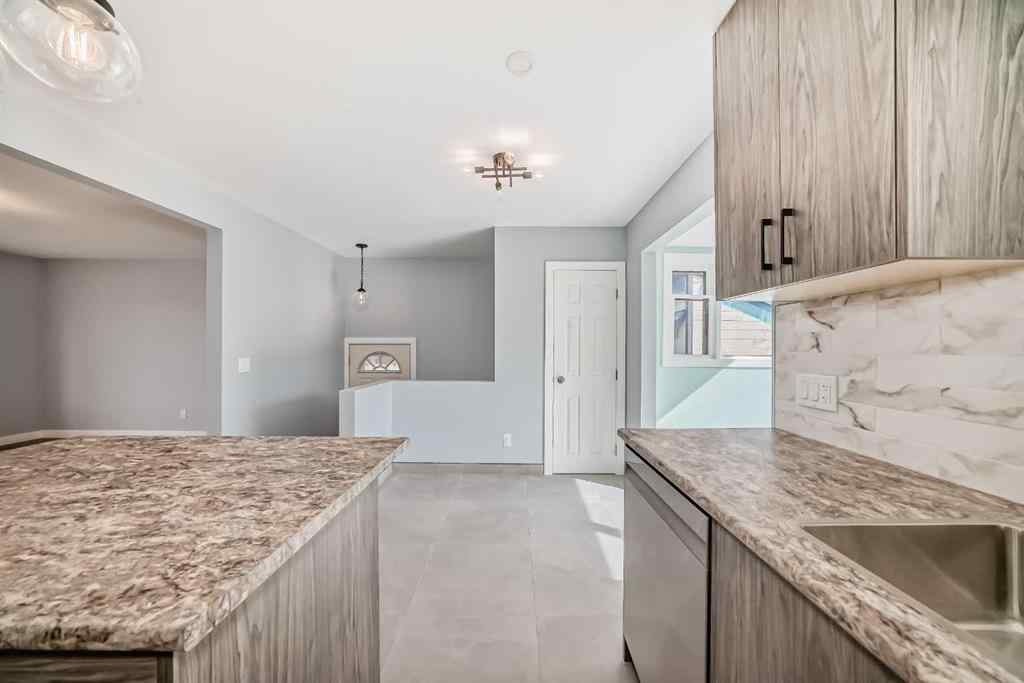 MLS® A2263437 - 9408 5 Street SE in Acadia Calgary, Residential