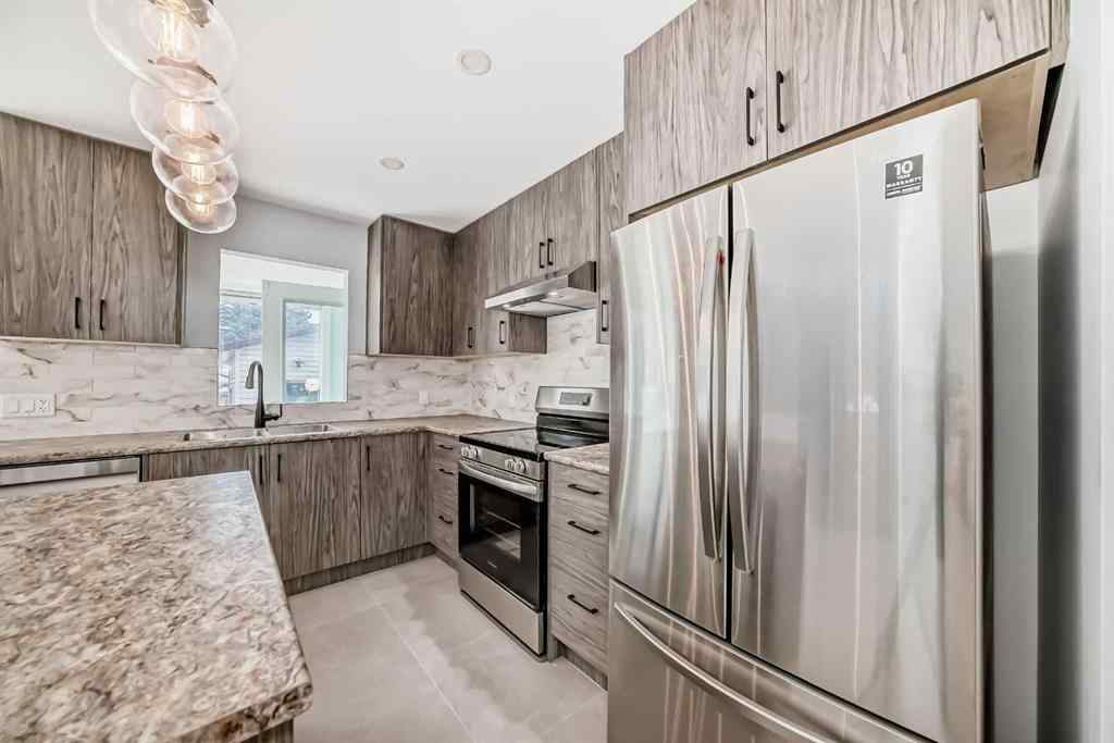 MLS® A2263437 - 9408 5 Street SE in Acadia Calgary, Residential