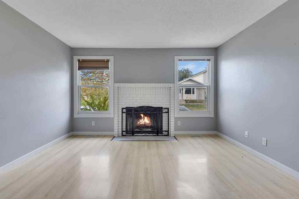 MLS® A2263459 - 164 Deerview Way SE in Deer Ridge Calgary, Residential