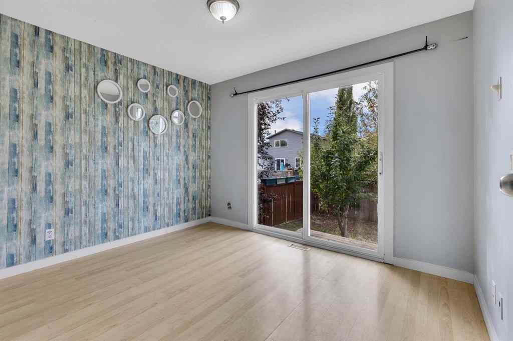 MLS® A2263459 - 164 Deerview Way SE in Deer Ridge Calgary, Residential