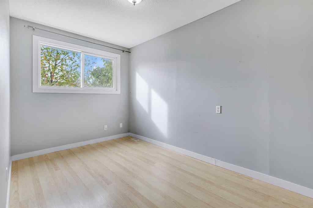 MLS® A2263459 - 164 Deerview Way SE in Deer Ridge Calgary, Residential