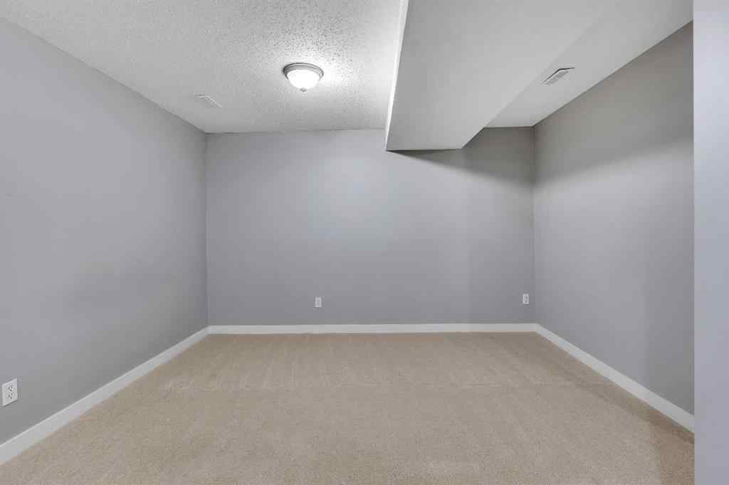 MLS® A2263459 - 164 Deerview Way SE in Deer Ridge Calgary, Residential