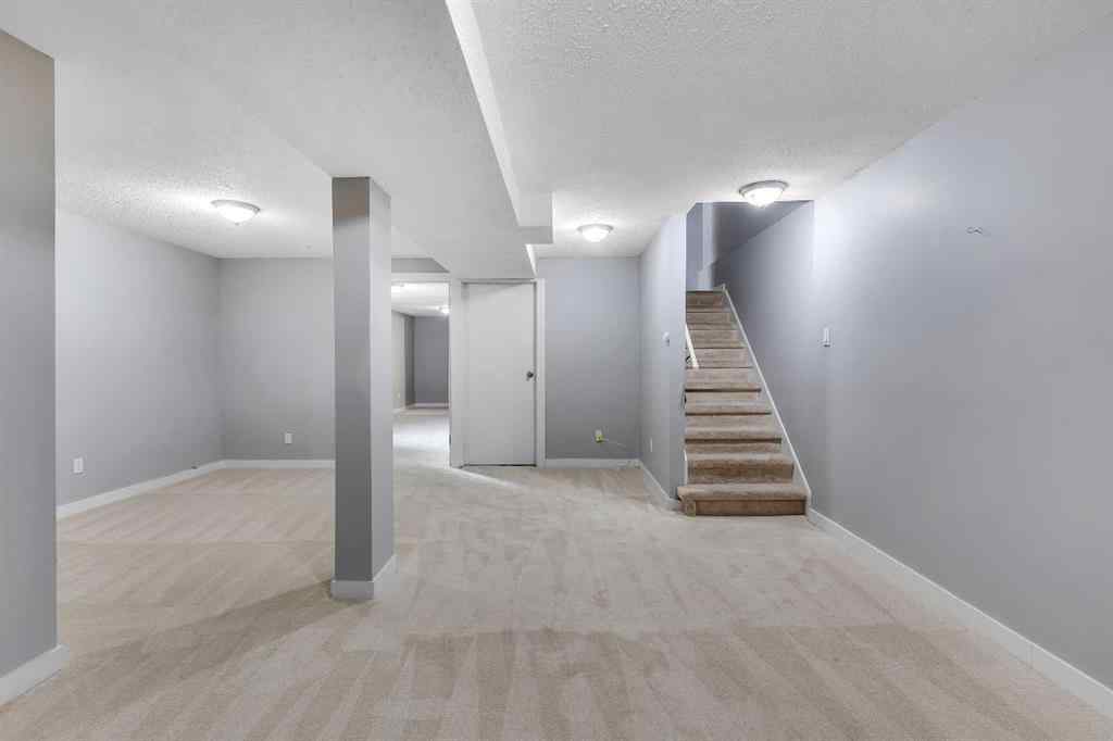 MLS® A2263459 - 164 Deerview Way SE in Deer Ridge Calgary, Residential