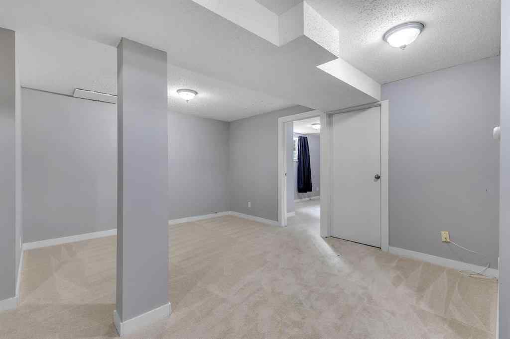 MLS® A2263459 - 164 Deerview Way SE in Deer Ridge Calgary, Residential
