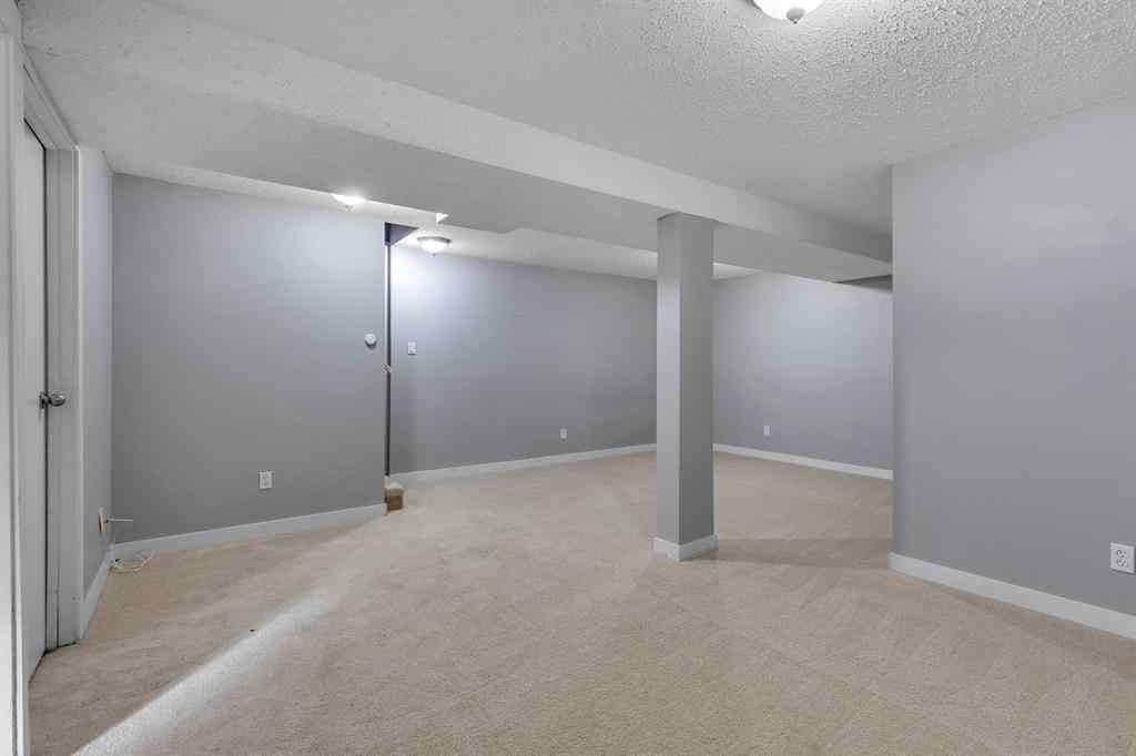 MLS® A2263459 - 164 Deerview Way SE in Deer Ridge Calgary, Residential