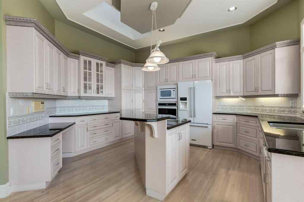 MLS® A2263476 - 14 Patina Lane SW in Patterson Calgary, Residential